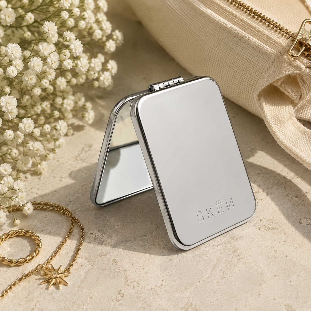 Skēn - The Pocket Mirror